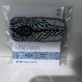 Beaded bracelet on a branded card in clear plastic packaging