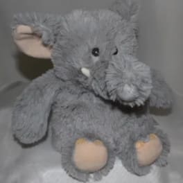 Gray plush elephant toy with pink inner ears and feet