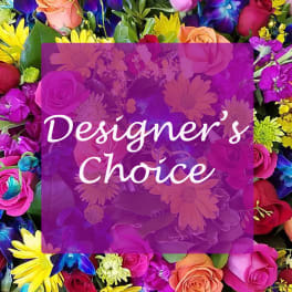 Colorful mixed flower arrangement with a purple "Designer’s Choice" overlay