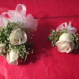 corsage of white roses