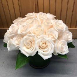 White rose bouquet in a black vase