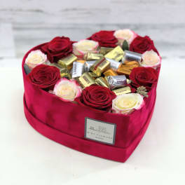 Heart-shaped box of roses filled with assorted chocolates