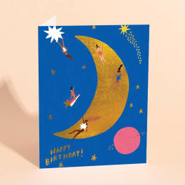 Birthday card with a gold moon, stars, and tiny dancers on a blue background