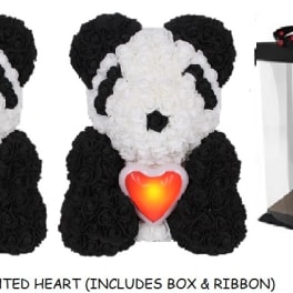 Black-and-white panda-shaped rose arrangement with a red heart and gift box