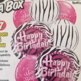 Pink and zebra-print birthday balloons with "Happy Birthday" text