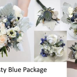 Dusty blue bridal bouquet with white roses and thistle