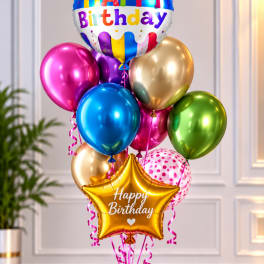 Birthday balloon bouquet with colorful foil balloons and a gold star balloon