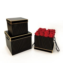 Black gift boxes with red roses in one box
