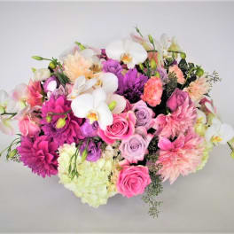Mixed bouquet with pink, purple, and white flowers