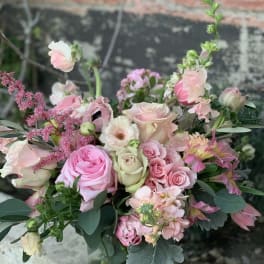 Pink and white mixed bouquet in a glass vase