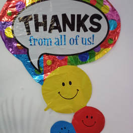 Colorful thank-you balloon with smiley faces