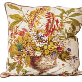 Decorative floral-print throw pillow with a vase of flowers