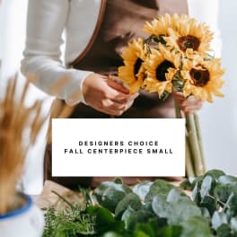 Person holding a small bouquet of yellow sunflowers with a text overlay