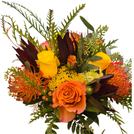 Orange and yellow roses with orange pincushion blooms in a bouquet