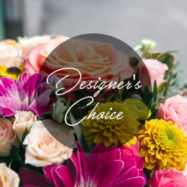 Mixed bouquet of roses and chrysanthemums in pink, peach, and yellow