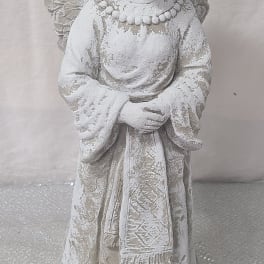 White angel figurine with wings and folded hands