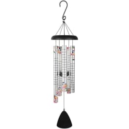 Hanging metal wind chime with floral printed tubes and a black clapper