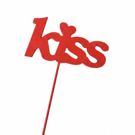 Red "kiss" cake topper on a stick