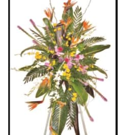 Tall tropical floral standing spray with orange and pink blooms