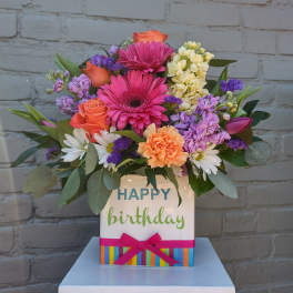 Mixed bouquet in a birthday gift box with roses, gerbera daisies, and carnations