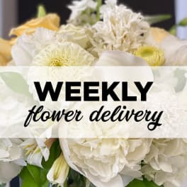 White and pale yellow flower bouquet with "weekly flower delivery" text overlay