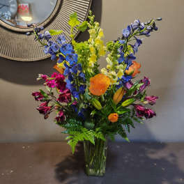 Colorful mixed bouquet in a clear glass vase