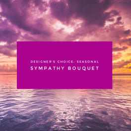 Purple sympathy bouquet text over a sunset ocean background