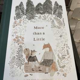 Illustrated book cover with foxes and forest plants