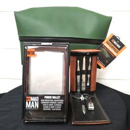 Men's grooming gift set with green toiletry bag, power wallet, and manicure kit in leather case