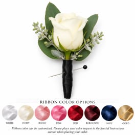 White rose boutonniere with black ribbon wrap and green leaves