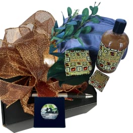 Men's gift set with soap, body scrub, and shea butter in a box
