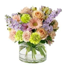 Mixed pastel bouquet in a clear glass vase