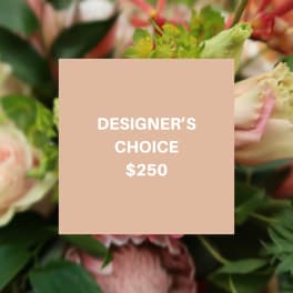 Designer’s choice floral arrangement with pink and green blooms