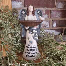 Angel memorial figurine holding a bowl with a small bird