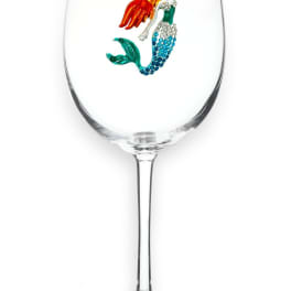 Clear wine glass with a colorful mermaid design