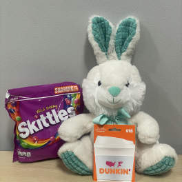 Plush bunny with a Skittles bag and Dunkin' gift card