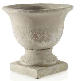 Weathered stone urn planter with a wide flared rim