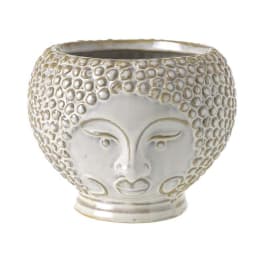 Decorative ceramic planter with a sculpted face and textured surface