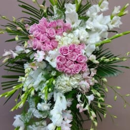 Standing floral spray with pink roses and white flowers