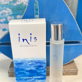 Cologne spray bottle and box with blue ocean-themed packaging