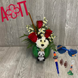 Red roses and white daisies in a green vase with a panda charm