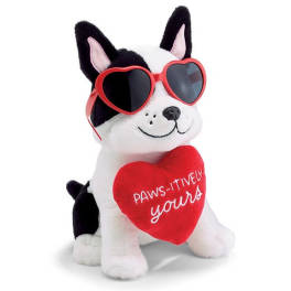 Plush dog wearing heart-shaped sunglasses and holding a red heart