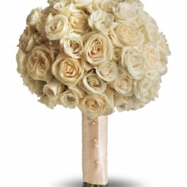 Cream rose bridal bouquet with a satin-wrapped handle