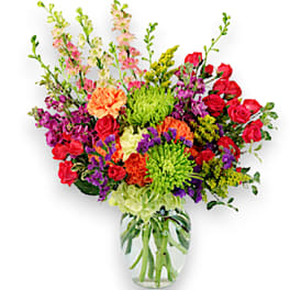 Colorful mixed bouquet in a clear glass vase