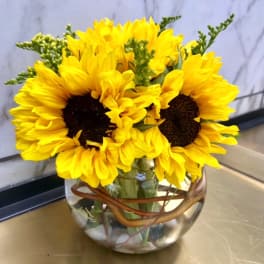 Sunflower bouquet in a clear glass vase