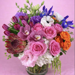 Colorful mixed bouquet in a clear glass vase