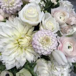 Bouquet of white and pale pink flowers with large blooms