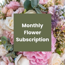 Pink and white flower arrangement with a text overlay reading Monthly Flower Subscription