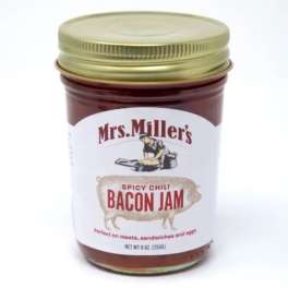 Jar of spicy chili bacon jam with a gold lid