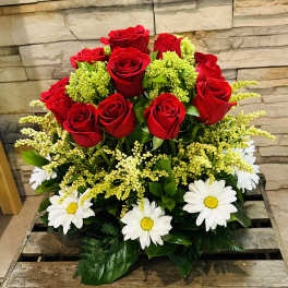 Bouquet of red roses and white daisies with yellow filler flowers